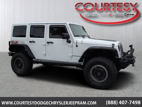 Used 2016 Jeep Wrangler Unlimited Sahara AWD/4WD image 1