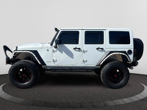 Used 2015 Jeep Wrangler Unlimited Sahara AWD/4WD image 1