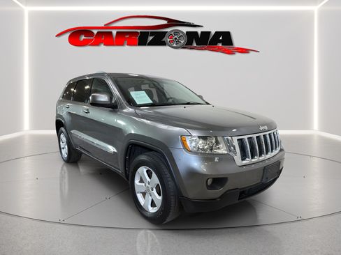 Used 2011 Jeep Grand Cherokee Laredo AWD/4WD image 1