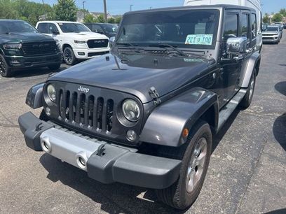 Used 2014 Jeep Wrangler Unlimited Sahara w/ Dual Top Group