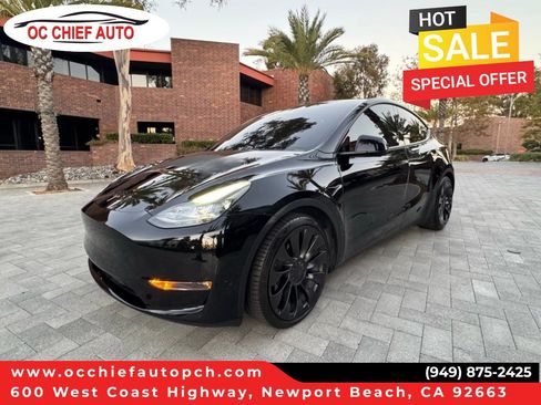 Used 2024 Tesla Model Y Performance AWD/4WD image 1