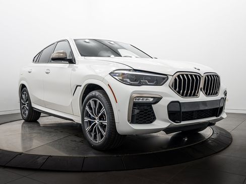 Used 2020 BMW X6 M50i w/ Luxury Seating Package AWD/4WD image 1