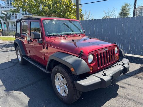 Used 2013 Jeep Wrangler Unlimited Sport AWD/4WD image 1