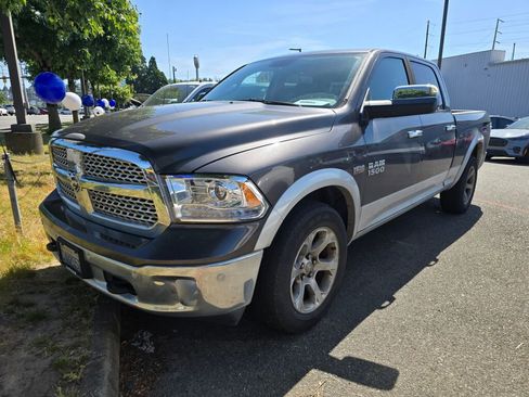 Used 2014 RAM 1500 Laramie w/ Convenience Group AWD/4WD image 1