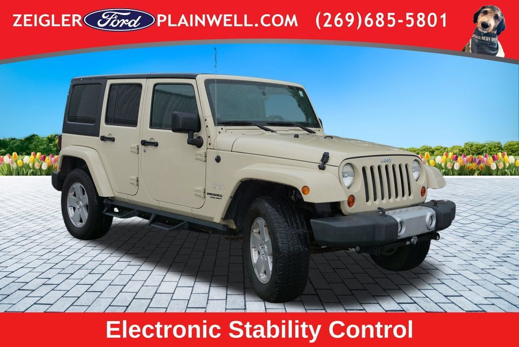 Used 2011 Jeep Wrangler Unlimited Sahara w/ Dual Top Group AWD/4WD image 7