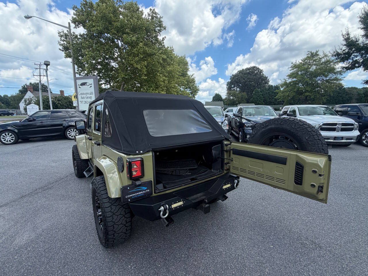 Used 2013 Jeep Wrangler Unlimited Sahara w/ Dual Top Group AWD/4WD image 6