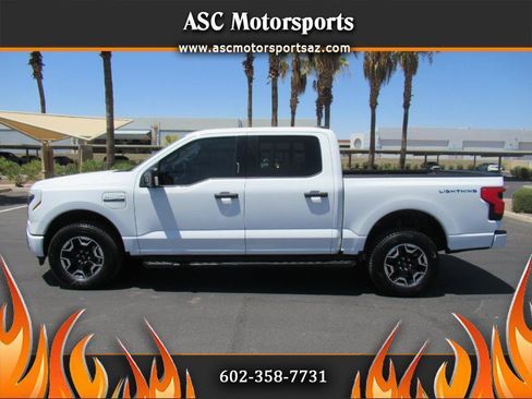 Used 2023 Ford F150 Lightning XLT AWD/4WD image 1