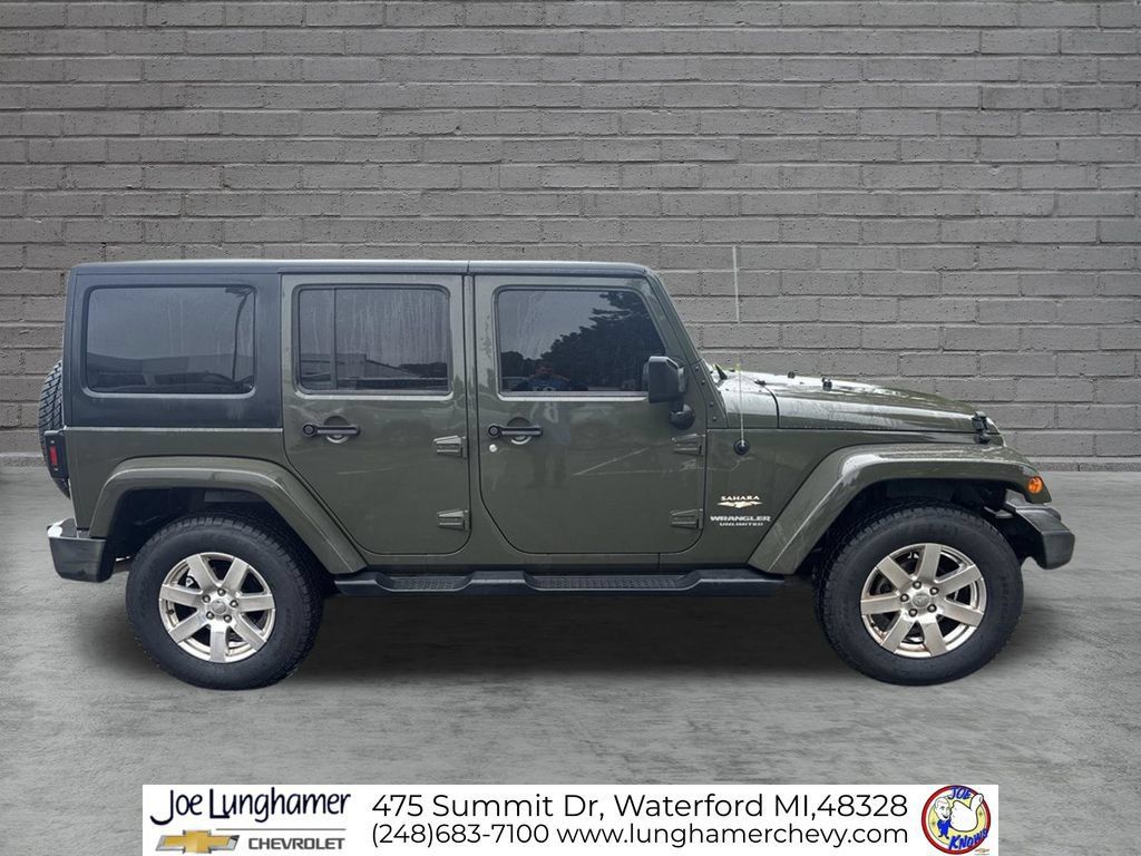 Used 2015 Jeep Wrangler Unlimited Sahara w/ Dual Top Group AWD/4WD image 2