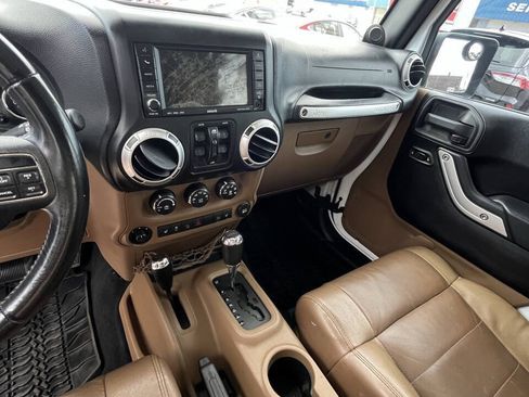 Used 2011 Jeep Wrangler Unlimited Sahara w/ Dual Top Group AWD/4WD image 14