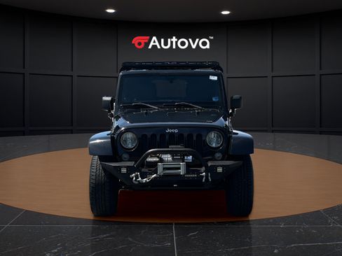 Used 2014 Jeep Wrangler Unlimited Sahara w/ Dual Top Group AWD/4WD image 8