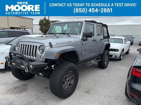 Used 2015 Jeep Wrangler Unlimited Rubicon w/ Dual Top Group image 1