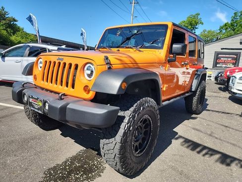 Used 2013 Jeep Wrangler Unlimited Sport AWD/4WD image 1