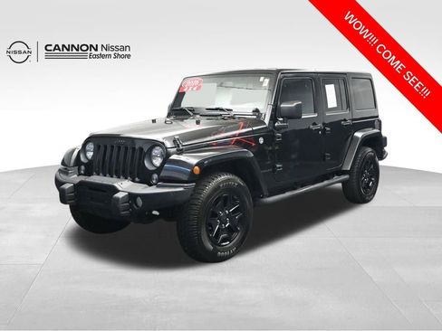 Used 2016 Jeep Wrangler Unlimited Sahara AWD/4WD image 1