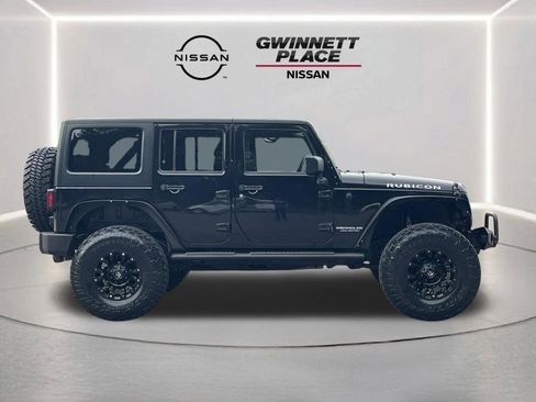 Used 2016 Jeep Wrangler Unlimited Rubicon w/ Dual Top Group AWD/4WD image 25