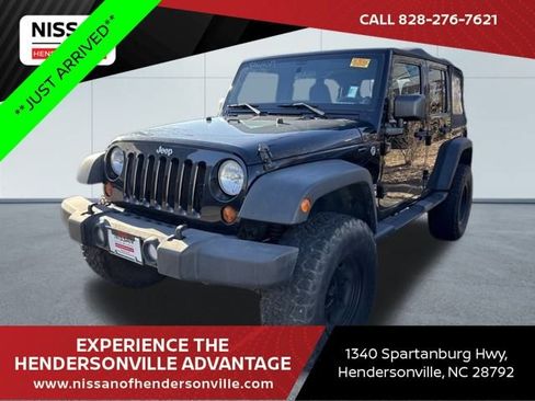 Used 2013 Jeep Wrangler Unlimited Sport image 1