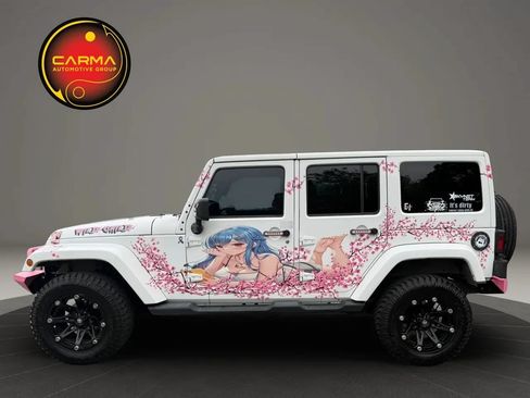 Used 2013 Jeep Wrangler Unlimited Sahara w/ Connectivity Group AWD/4WD image 2