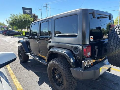 Used 2013 Jeep Wrangler Unlimited Sahara w/ Dual Top Group AWD/4WD image 3