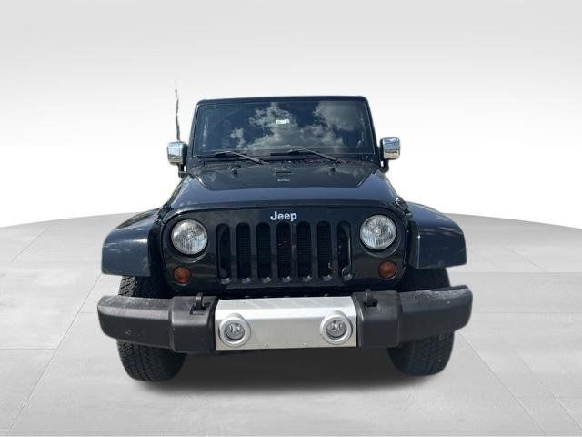 Used 2012 Jeep Wrangler Unlimited Sahara w/ Dual Top Group AWD/4WD image 8