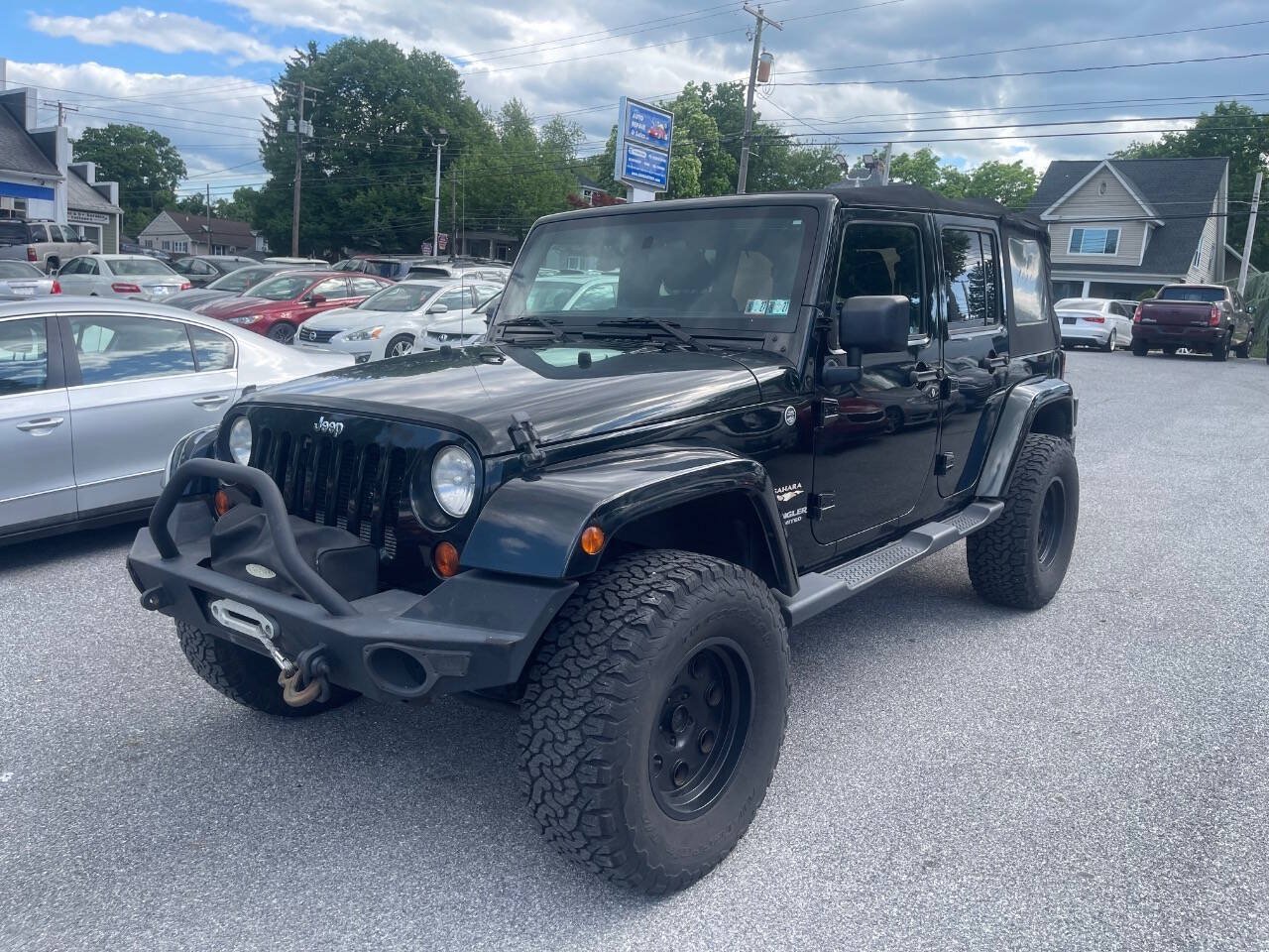 Used 2012 Jeep Wrangler Unlimited Sahara w/ Dual Top Group AWD/4WD image 2