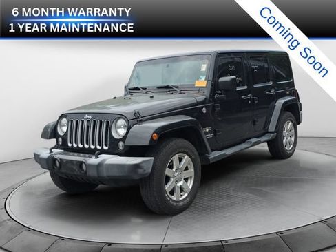 Used 2016 Jeep Wrangler Unlimited Sahara w/ Max Tow Package AWD/4WD image 1