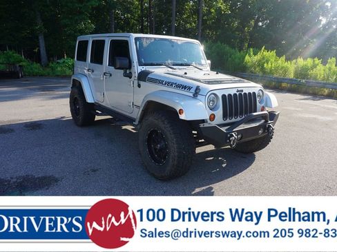 Used 2012 Jeep Wrangler Unlimited Sahara AWD/4WD image 1
