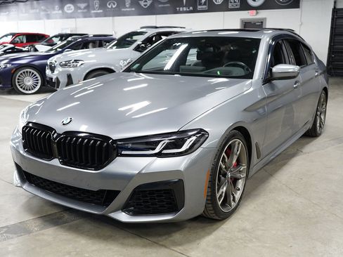 Used 2023 BMW M550i xDrive w/ Executive Package AWD/4WD image 1
