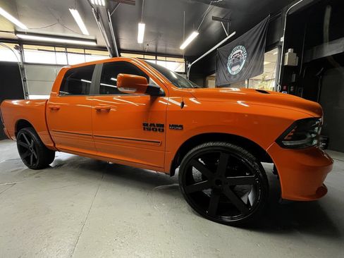 Used 2015 RAM 1500 Sport w/ Ignition Orange Sport Package RWD image 1