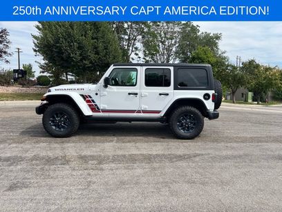 New 2026 Jeep Wrangler Unlimited Sport w/ Dual Top Group
