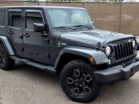 Used 2017 Jeep Wrangler Unlimited Sahara AWD/4WD image 1