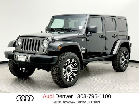 Used 2014 Jeep Wrangler Unlimited Sport image 1