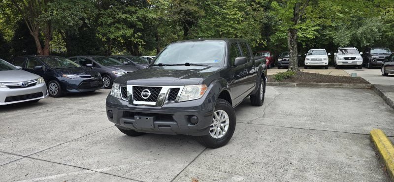 Used 2015 Nissan Frontier SV AWD/4WD image 1