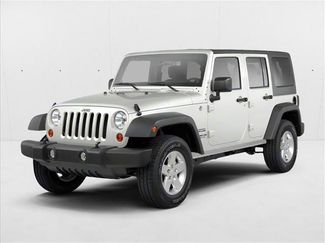 Used 2012 Jeep Wrangler Unlimited Sahara w/ Dual Top Group video 1