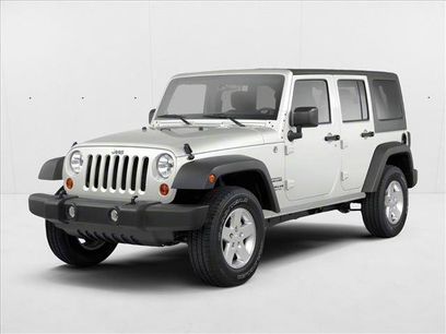 Used 2012 Jeep Wrangler Unlimited Sahara w/ Dual Top Group