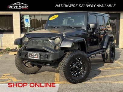 Used 2012 Jeep Wrangler Unlimited Rubicon w/ Connectivity Group