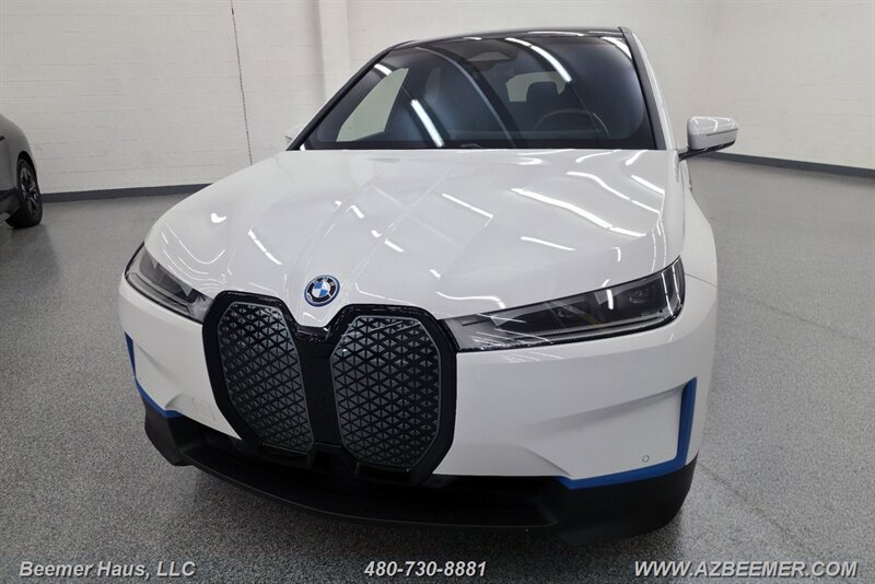Used 2024 BMW iX xDrive50 w/ BMW I Signature Blue Package AWD/4WD image 1
