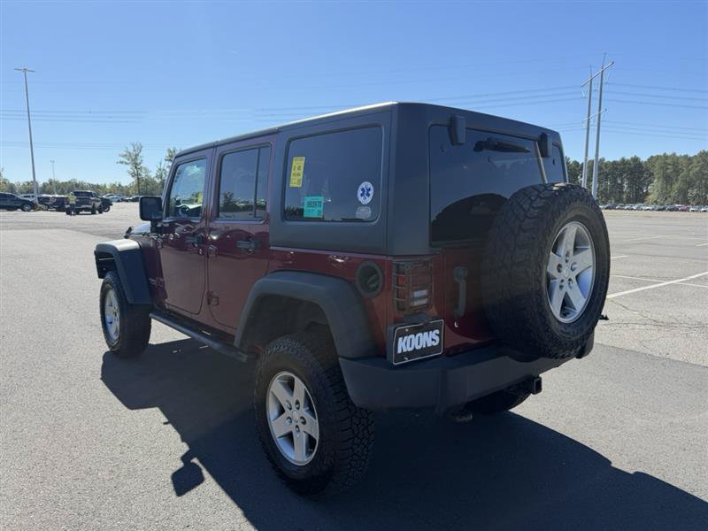 Used 2012 Jeep Wrangler Unlimited Rubicon w/ Dual Top Group AWD/4WD image 9