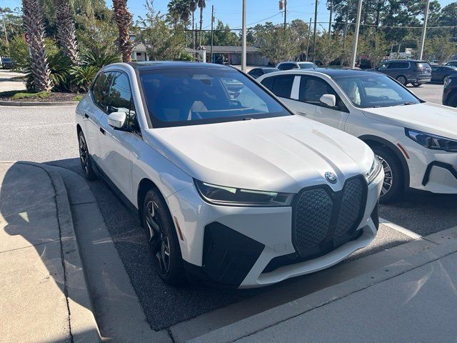 Used 2024 BMW iX xDrive50 w/ Premium Package AWD/4WD image 1