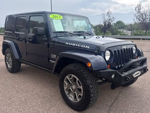 Used 2013 Jeep Wrangler Unlimited Rubicon w/ Dual Top Group AWD/4WD image 19