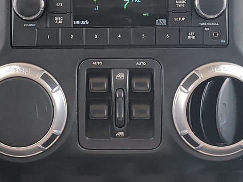 Used 2012 Jeep Wrangler Unlimited Sahara w/ Dual Top Group AWD/4WD image 23