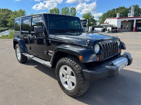 Used 2012 Jeep Wrangler Unlimited Sahara w/ Dual Top Group AWD/4WD image 7