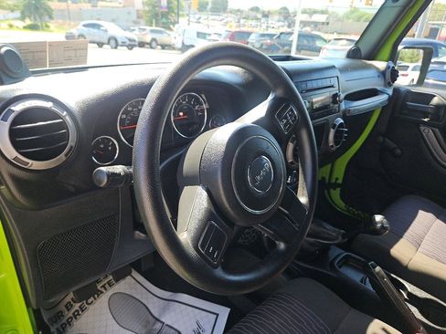 Used 2012 Jeep Wrangler Unlimited Sport AWD/4WD image 13