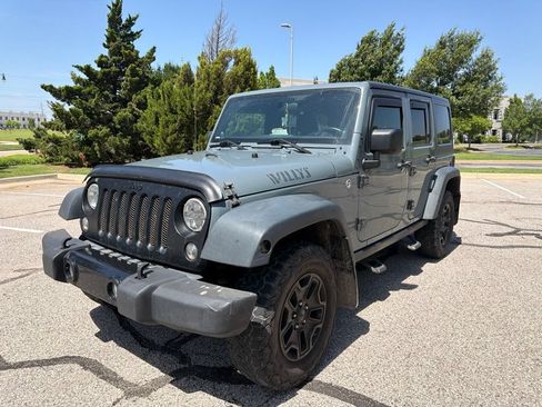 Used 2014 Jeep Wrangler Unlimited Sport AWD/4WD image 1