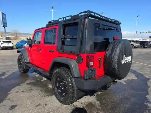 Used 2012 Jeep Wrangler Unlimited Rubicon w/ Dual Top Group AWD/4WD image 2