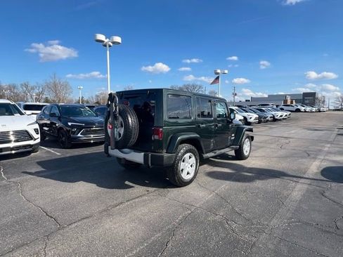 Used 2011 Jeep Wrangler Unlimited Sahara w/ Dual Top Group AWD/4WD image 4