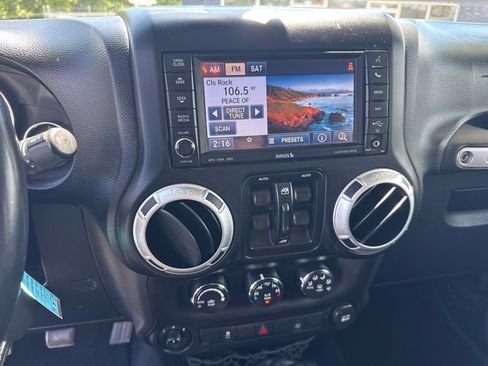 Used 2013 Jeep Wrangler Unlimited Sahara w/ Mopar Chrome Edition Group AWD/4WD image 16