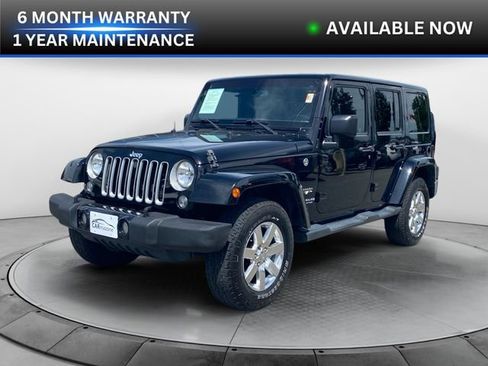Used 2016 Jeep Wrangler Unlimited Sahara w/ Max Tow Package AWD/4WD image 1