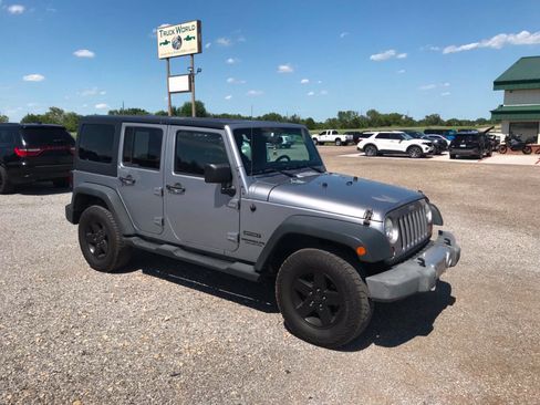 Used 2013 Jeep Wrangler Unlimited Sport AWD/4WD image 1