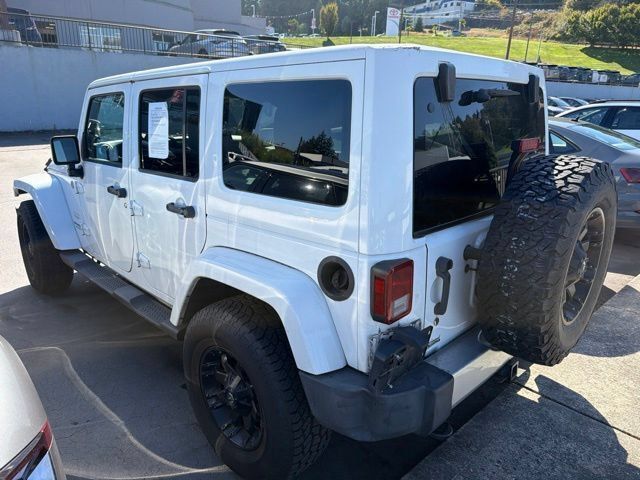 Used 2013 Jeep Wrangler Unlimited Sahara w/ Dual Top Group AWD/4WD image 2