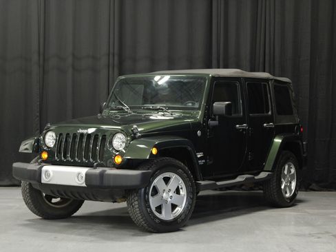 Used 2011 Jeep Wrangler Unlimited Sahara w/ Connectivity Group AWD/4WD image 1