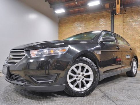 Used 2014 Ford Taurus SE image 1